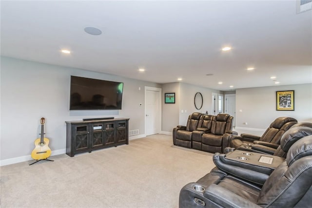 living room with baseboards, light carpet, recessed lighting, and visible vents