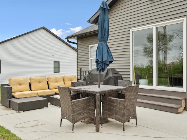view of patio featuring outdoor dining area and an outdoor living space