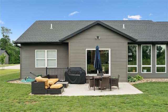 3120 Timber Ridge Ct, Hiawatha, IA 52233 - back of property with a patio area, a lawn, and roof with shingles