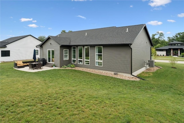 3120 Timber Ridge Ct, Hiawatha, IA 52233 - rear view of property featuring a patio area, a lawn, entry steps, and a shingled roof