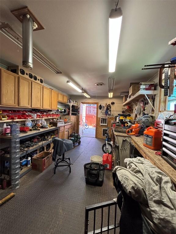 garage with a workshop area