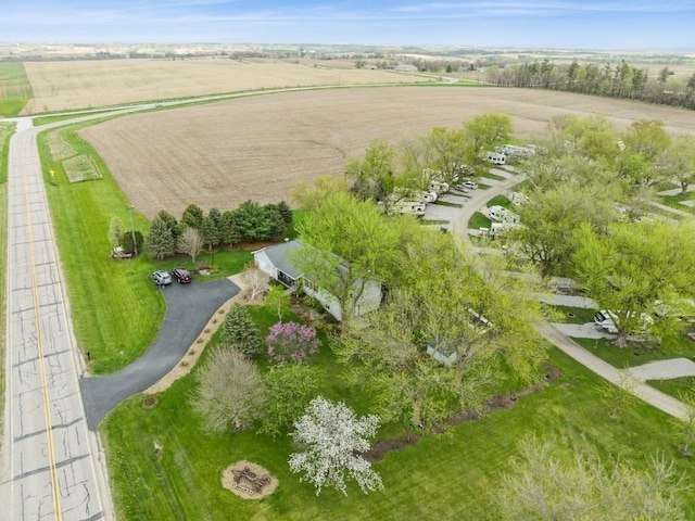 birds eye view of property featuring a rural view