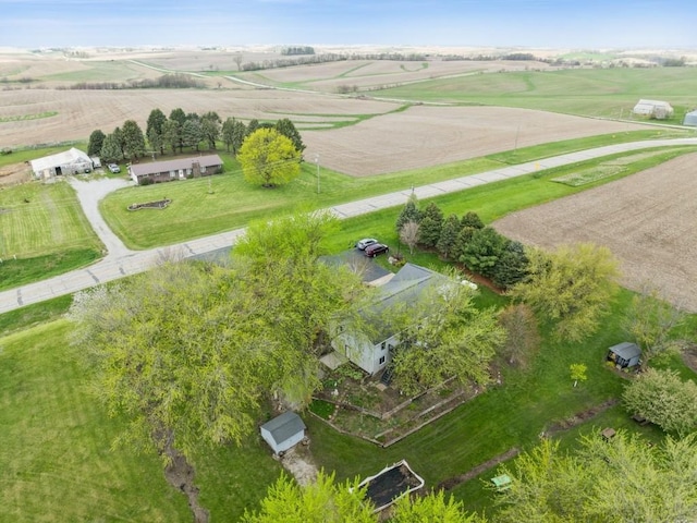 birds eye view of property featuring a rural view