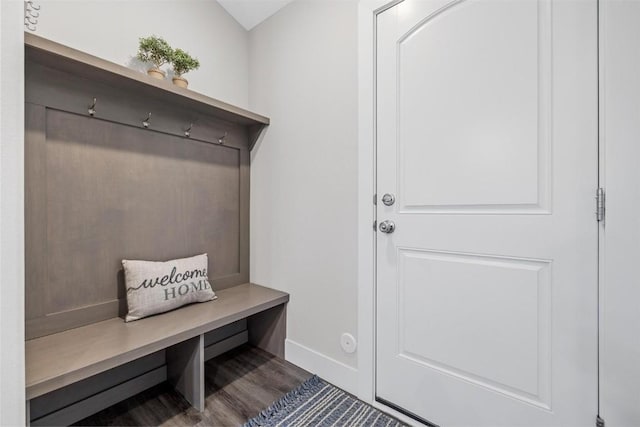 mudroom with baseboards and wood finished floors