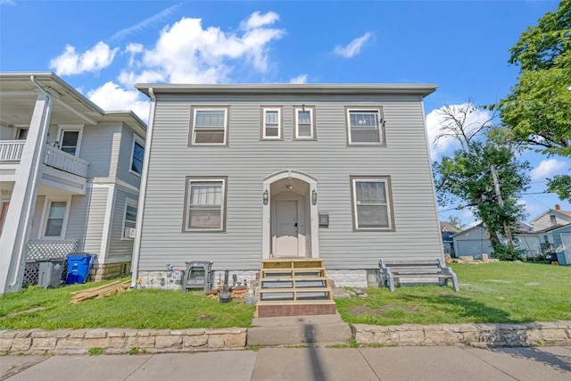 view of front facade with a front lawn