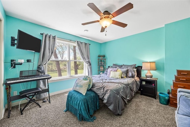 208 Willowood Dr, Hiawatha, IA 52233 - carpeted bedroom featuring baseboards and a ceiling fan
