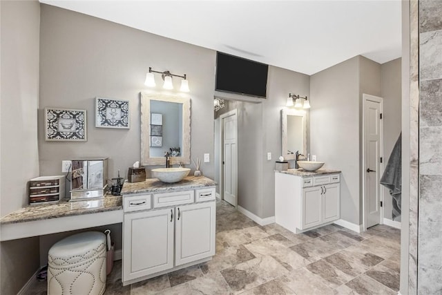 208 Willowood Dr, Hiawatha, IA 52233 - full bathroom featuring two vanities and baseboards