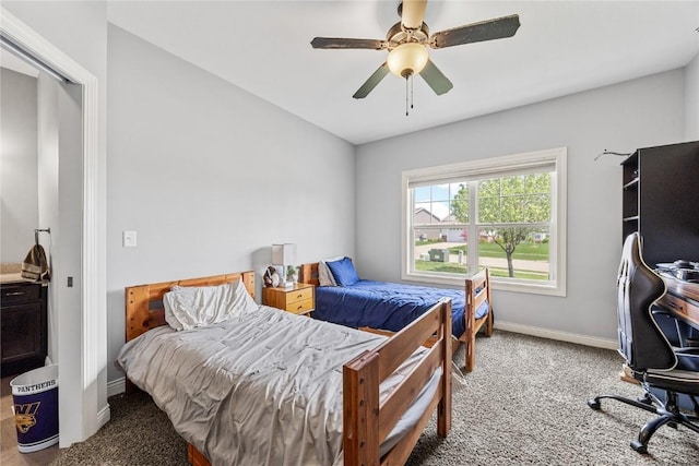 208 Willowood Dr, Hiawatha, IA 52233 - bedroom featuring carpet floors, baseboards, and a ceiling fan