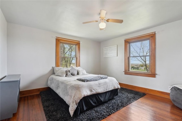 527 Swisher View Dr SW, Swisher, IA 52338 - bedroom featuring wood finished floors and ceiling fan