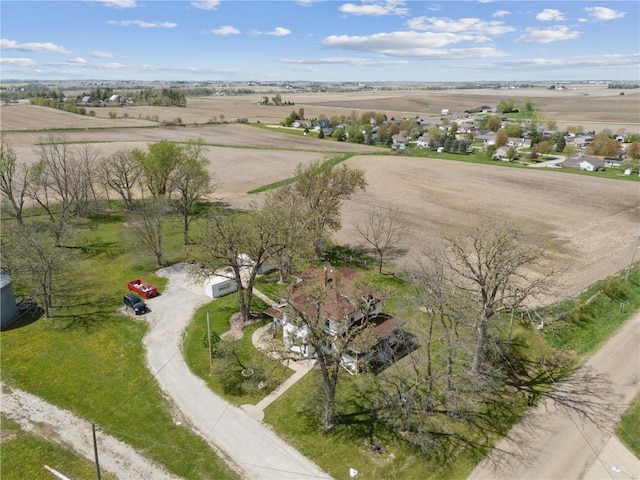 birds eye view of property featuring a rural view