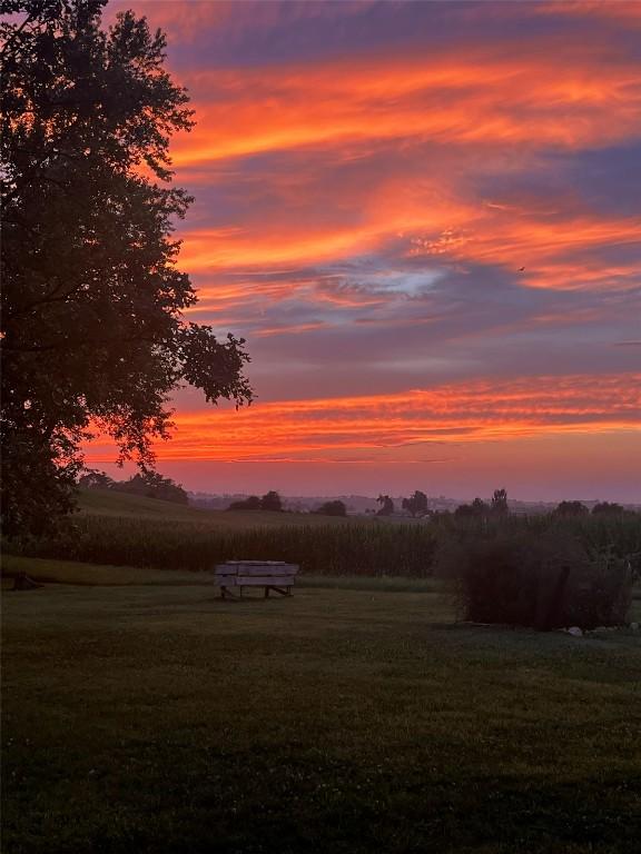 527 Swisher View Dr SW, Swisher, IA 52338 - yard at dusk featuring a view of rural / pastoral area