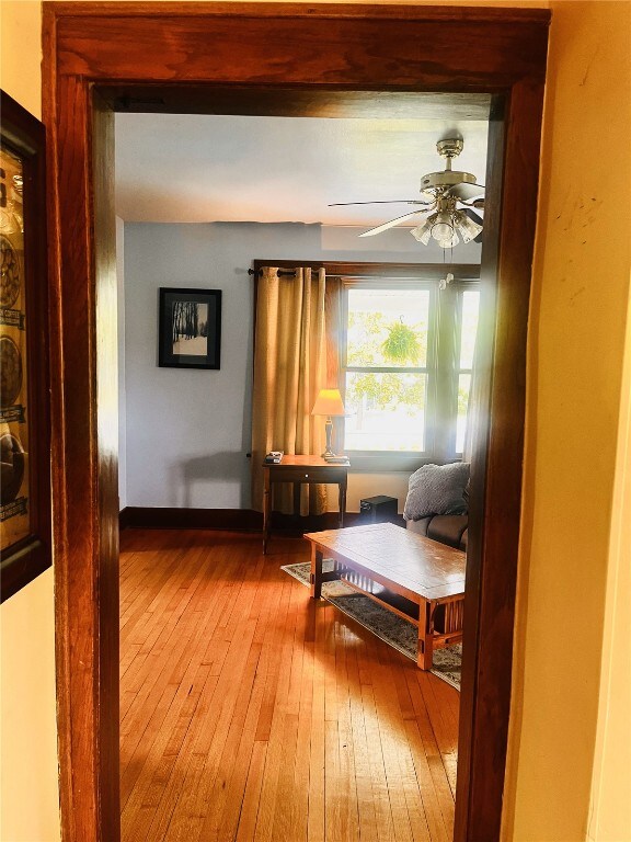 527 Swisher View Dr SW, Swisher, IA 52338 - sitting room featuring hardwood / wood-style floors and ceiling fan