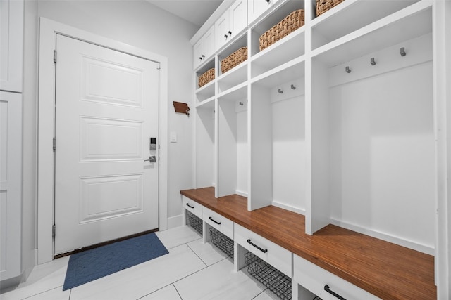 mudroom with light tile patterned floors