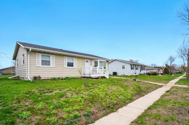 single story home featuring a front yard
