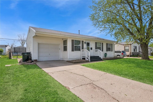 single story home with fence, an attached garage, driveway, and a front lawn