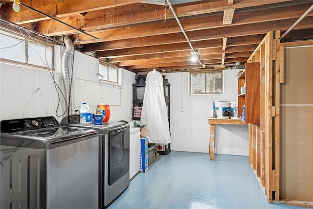 laundry area featuring laundry area and washing machine and clothes dryer