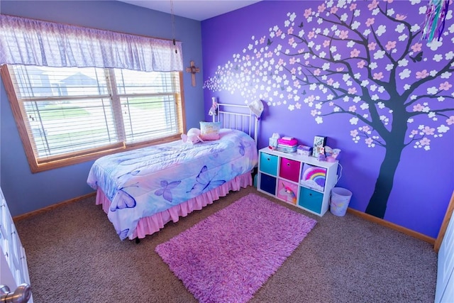 carpeted bedroom with baseboards