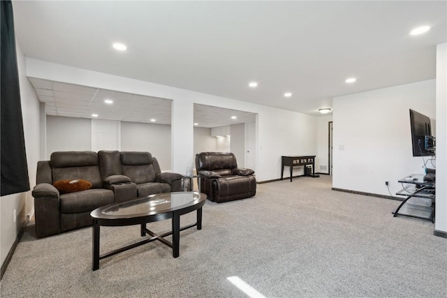living room featuring carpet flooring, recessed lighting, and baseboards