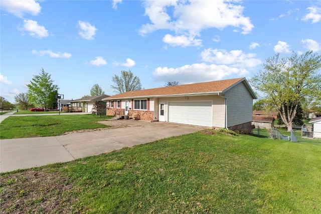 single story home featuring concrete driveway, an attached garage, fence, and a front yard