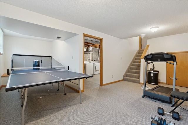 game room featuring washing machine and clothes dryer, baseboards, visible vents, and carpet floors