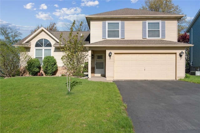 traditional home with a garage, a front yard, cooling unit, a shingled roof, and driveway