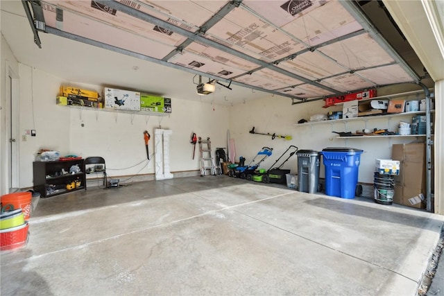 garage featuring a garage door opener