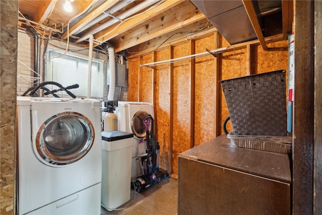 laundry room featuring separate washer and dryer and laundry area