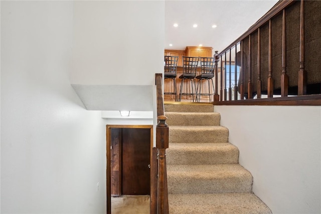 stairs with recessed lighting