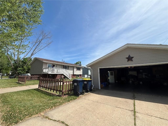 40 11th Ave, Hiawatha, IA 52233 - view of front facade with a garage