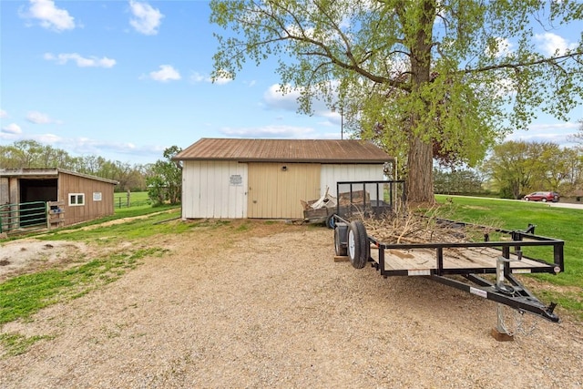 view of outbuilding with an outbuilding and an exterior structure