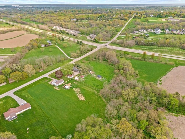 birds eye view of property featuring a rural view