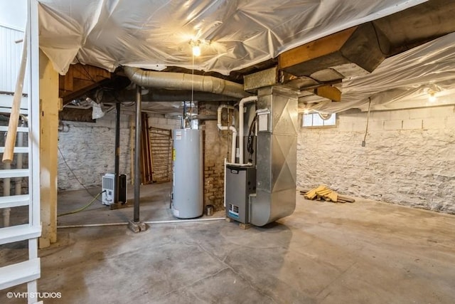 basement with heating unit and gas water heater