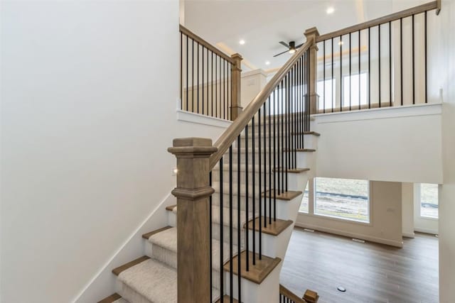 938 Heron Pl, Iowa City, IA 52245 - stairs with recessed lighting, a ceiling fan, and wood finished floors