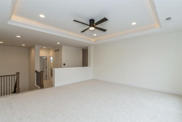 938 Heron Pl, Iowa City, IA 52245 - spare room with a raised ceiling, visible vents, recessed lighting, and light colored carpet