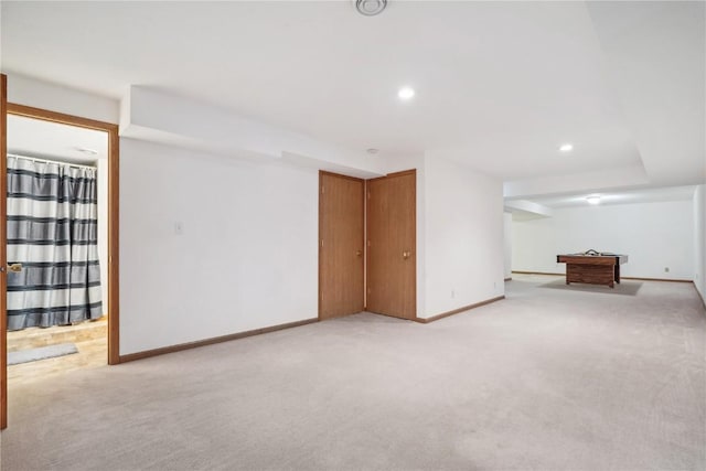 5141 25th Ave, Brandon, IA 52210 - finished below grade area with light colored carpet, recessed lighting, and baseboards