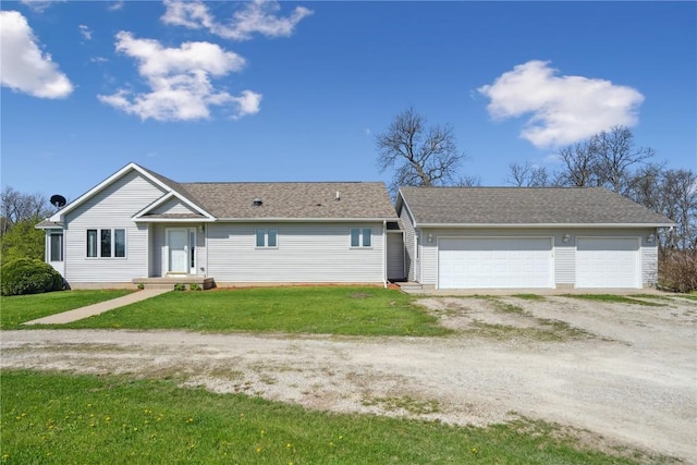 5141 25th Ave, Brandon, IA 52210 - ranch-style home with a garage, a front lawn, and dirt driveway