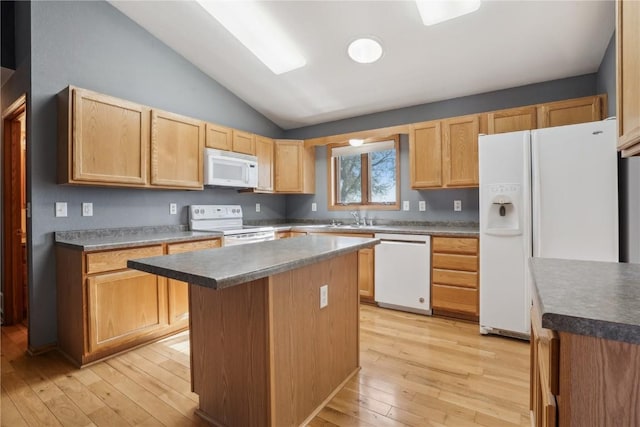 5141 25th Ave, Brandon, IA 52210 - kitchen with a kitchen island, light wood-type flooring, lofted ceiling, light brown cabinets, and white appliances