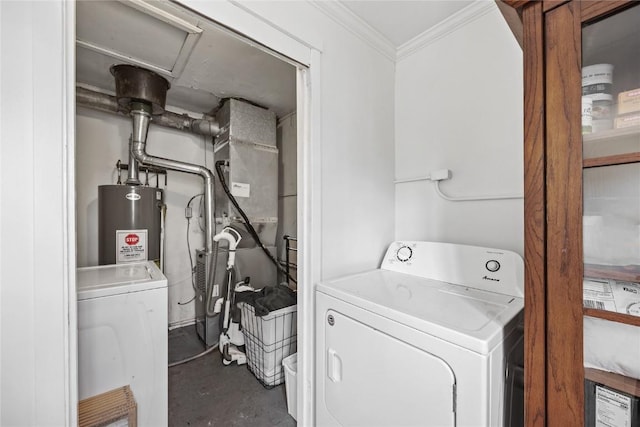 laundry room featuring laundry area, ornamental molding, washer / clothes dryer, and water heater