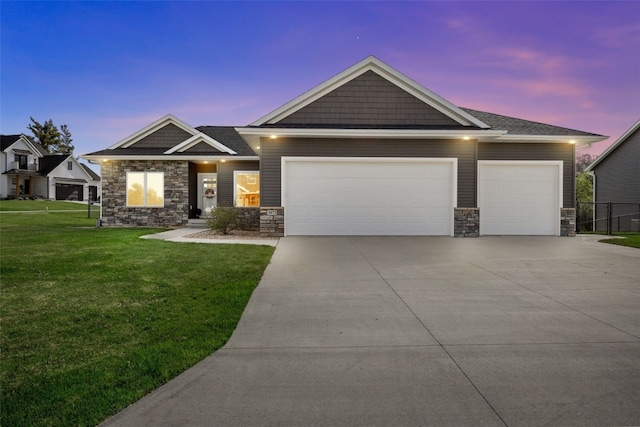 craftsman inspired home featuring concrete driveway, an attached garage, and stone siding