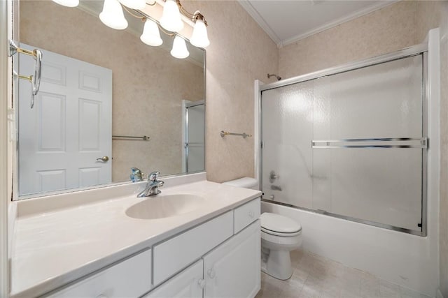 full bath featuring crown molding, tile patterned flooring, vanity, bath / shower combo with glass door, and toilet