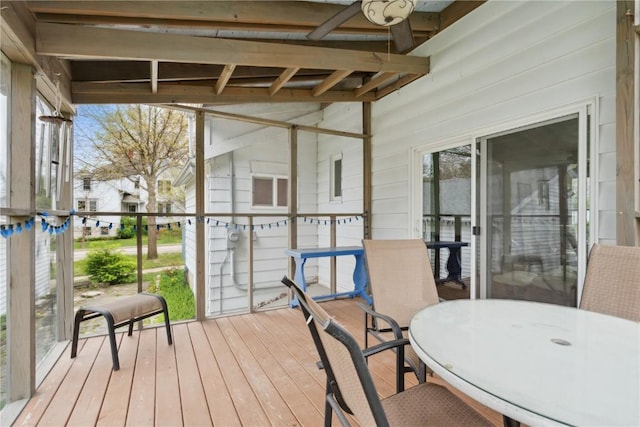 exterior space with ceiling fan