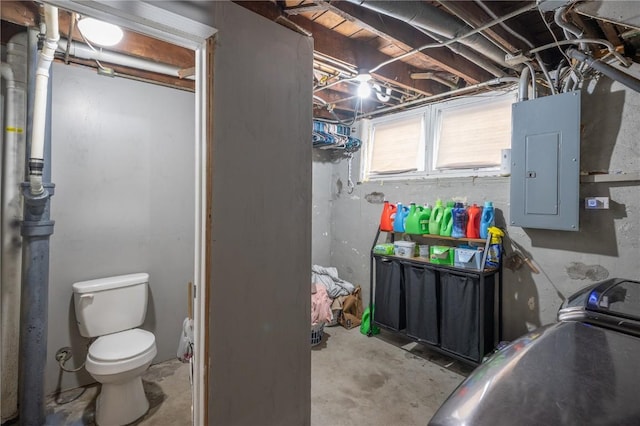 basement featuring electric panel