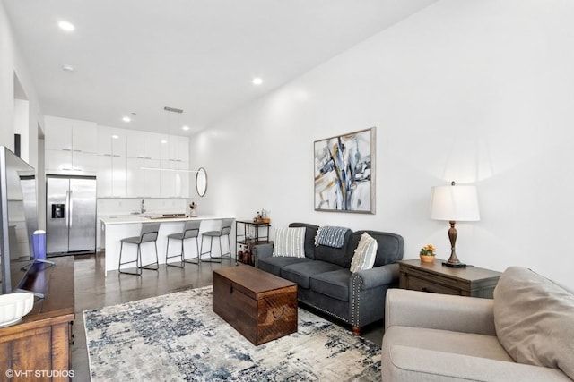 living area with recessed lighting