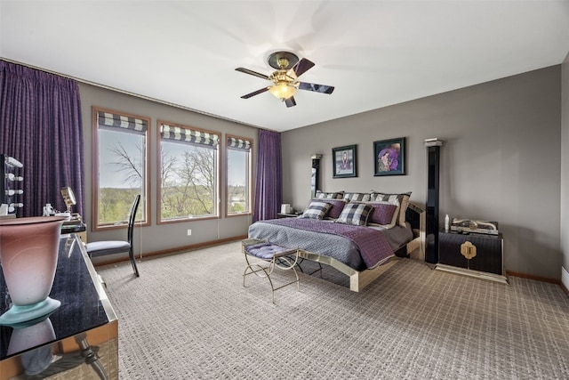 bedroom featuring baseboards, carpet, and ceiling fan
