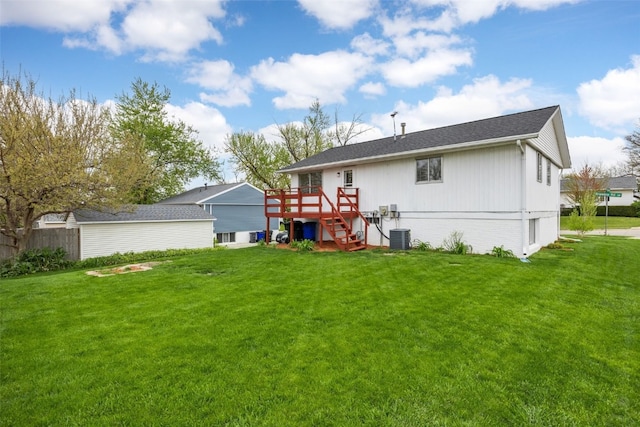 rear view of house featuring stairs, a wooden deck, a yard, and central air condition unit