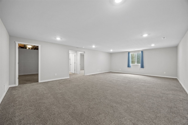 basement featuring carpet flooring, recessed lighting, and baseboards