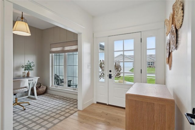 doorway to outside featuring light wood-type flooring