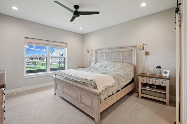 bedroom featuring recessed lighting, baseboards, light carpet, and ceiling fan