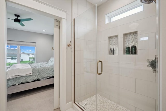 1405 Foxtail Dr, Fairfax, IA 52228 - full bath with ensuite bath, plenty of natural light, a stall shower, and a ceiling fan