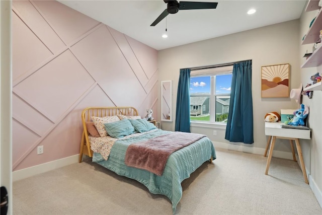 carpeted bedroom featuring a ceiling fan, baseboards, and recessed lighting